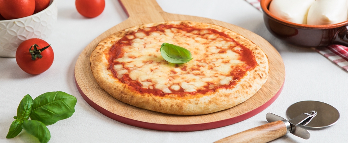 Pizza, birra e spalmabili dolci sono i cibi preferiti nel carrello degli italiani